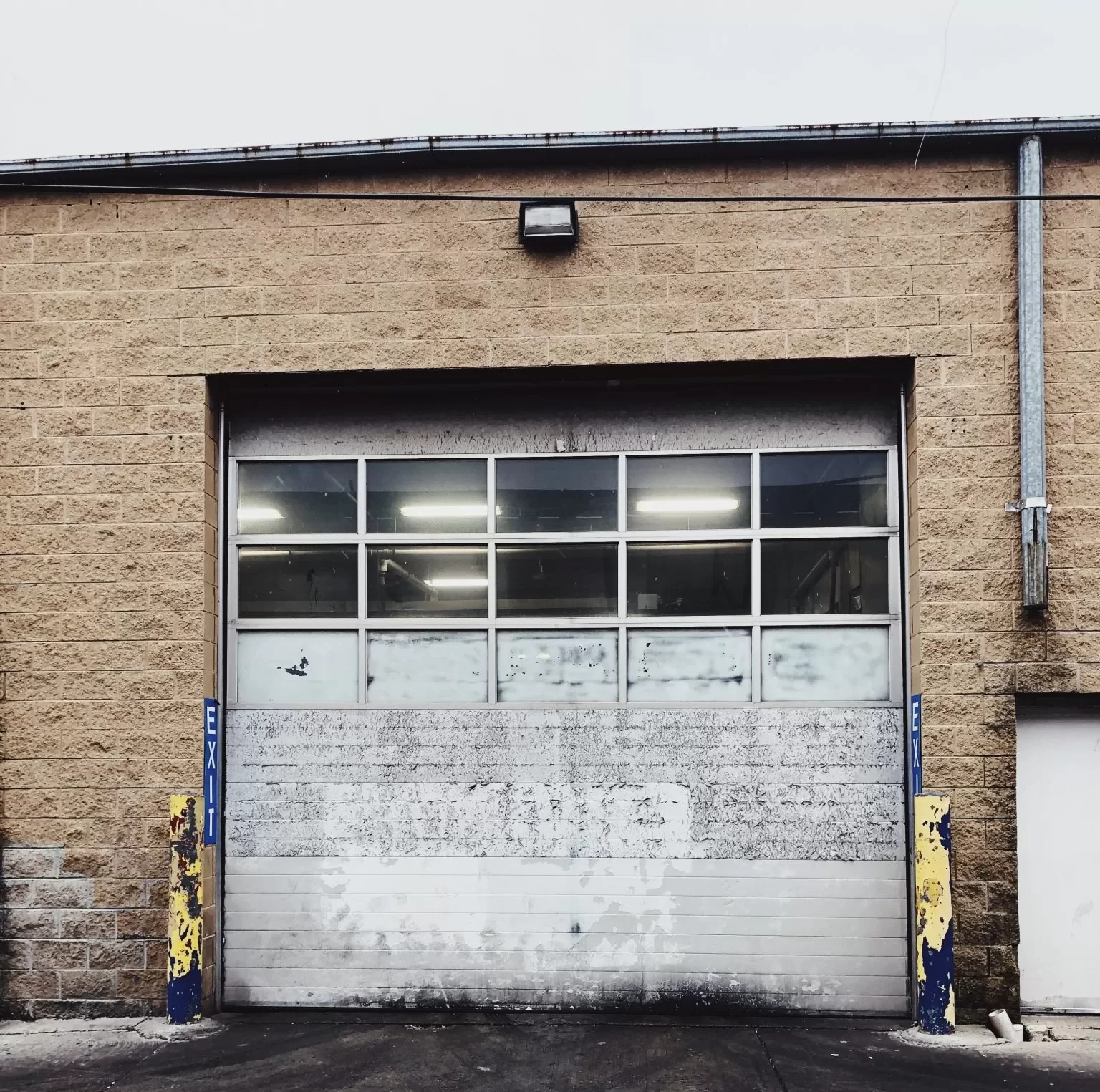 An old and broken garage door